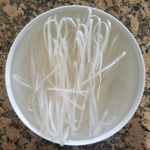 Pho noodles initial soaking for 20 minutes in warm water